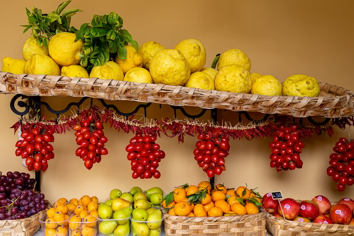 Lemons and other fruits in woven baskets