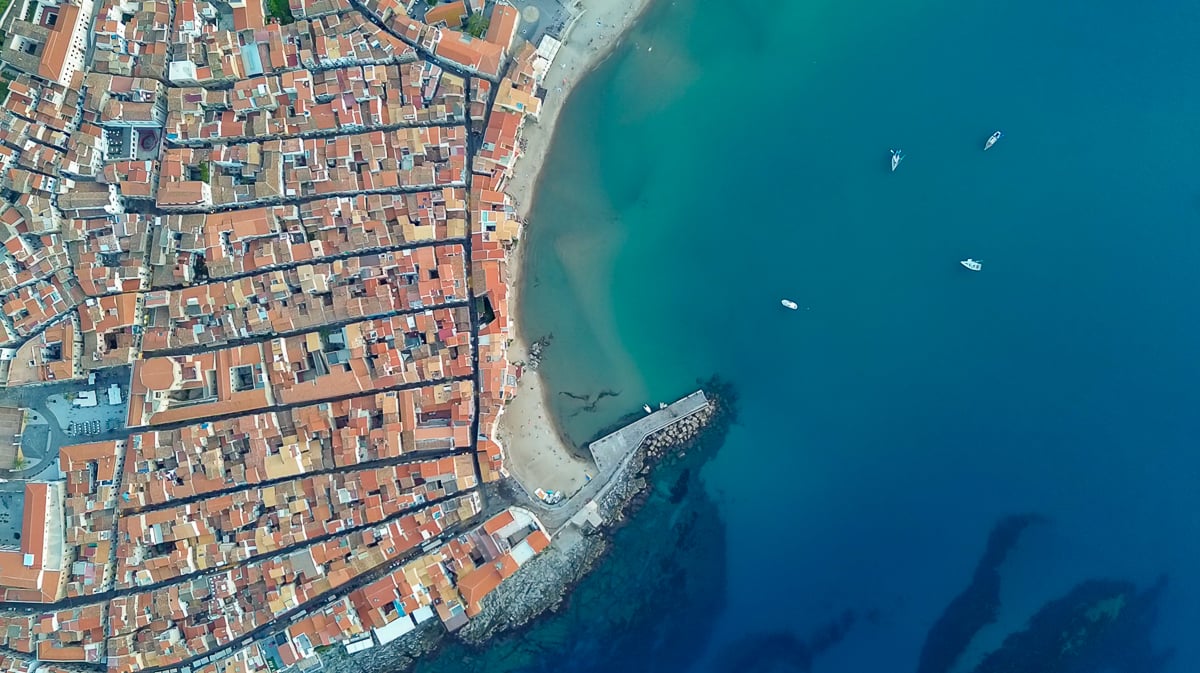 Aerial view of Cefalu along the Tyrrhenian Sea as seen during a paragliding adventure