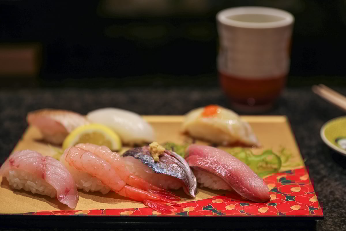 Assorted nigiri sushi with shrimp, tuna, mackerel, and squid at Maimon Sushi restaurant in Kanazawa, Japan.