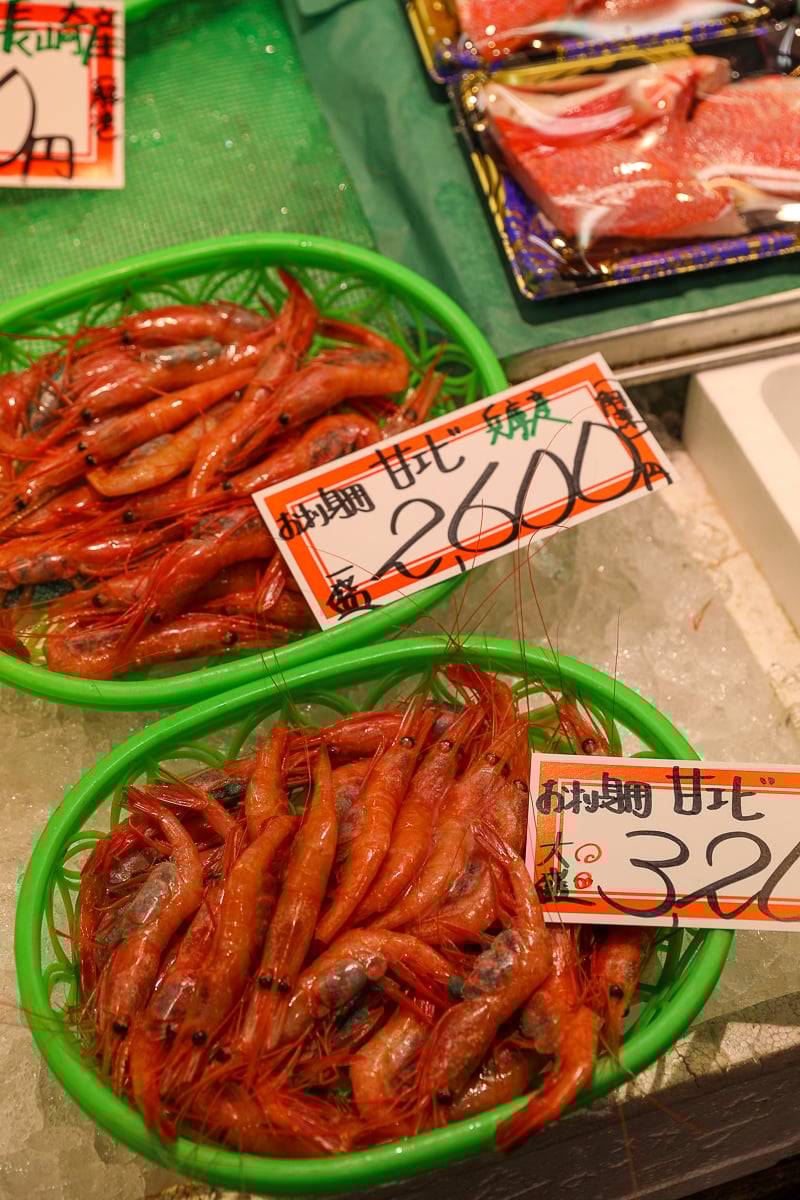 Fresh sweet shrimp, or amaebi, displayed on ice at Omicho Market.