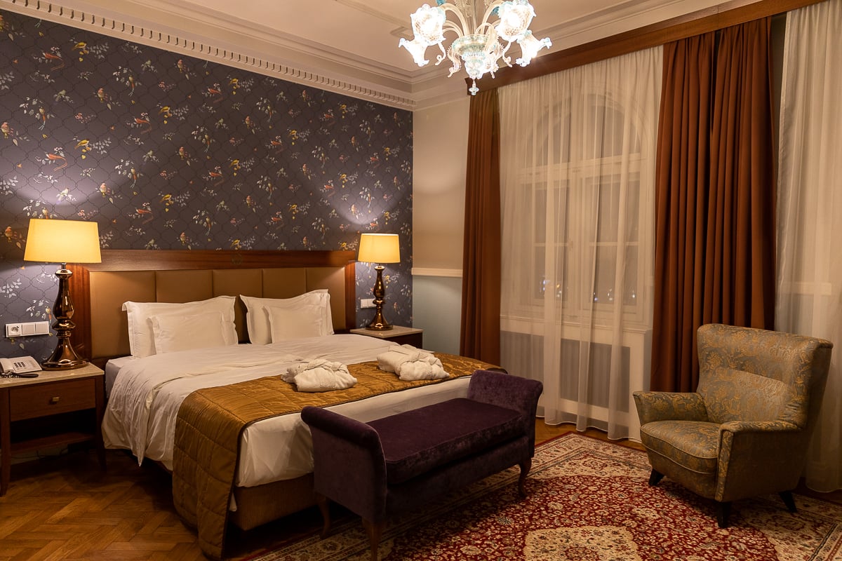 Classic hotel room in Prague with elegant furnishings and warm lighting