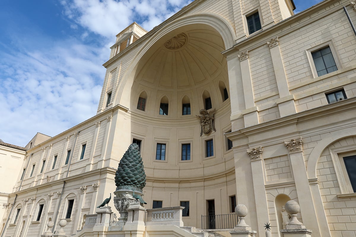 Pinecone Courtyard in Vatican City featuring the massive bronze pinecone sculpture framed by Renaissance architecture