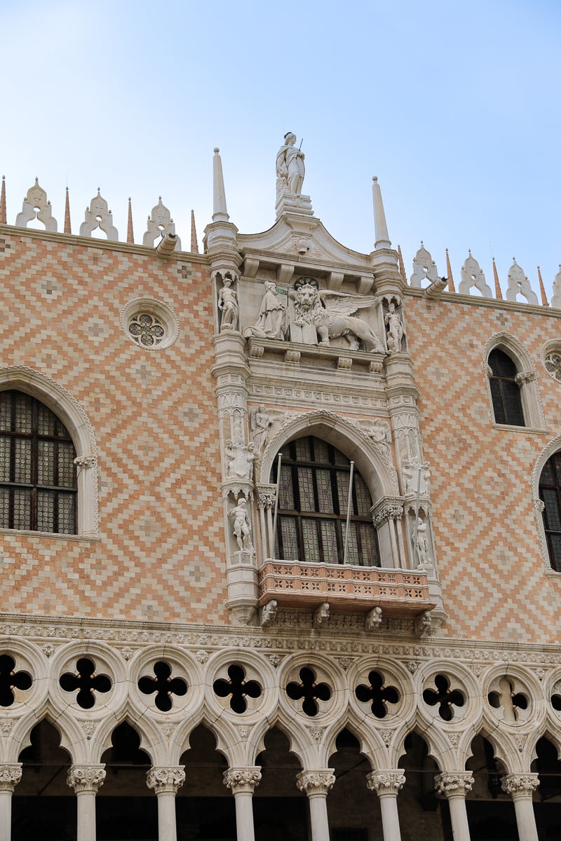 Doge’s Palace façade with pink diamond-shaped stonework and sculpted balcony, Venice