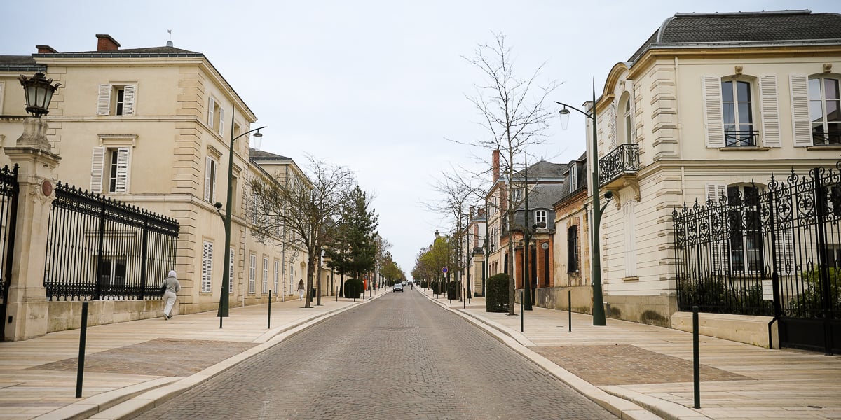 Cobblestone Avenue de Champagne lined with grand Champagne houses in Épernay