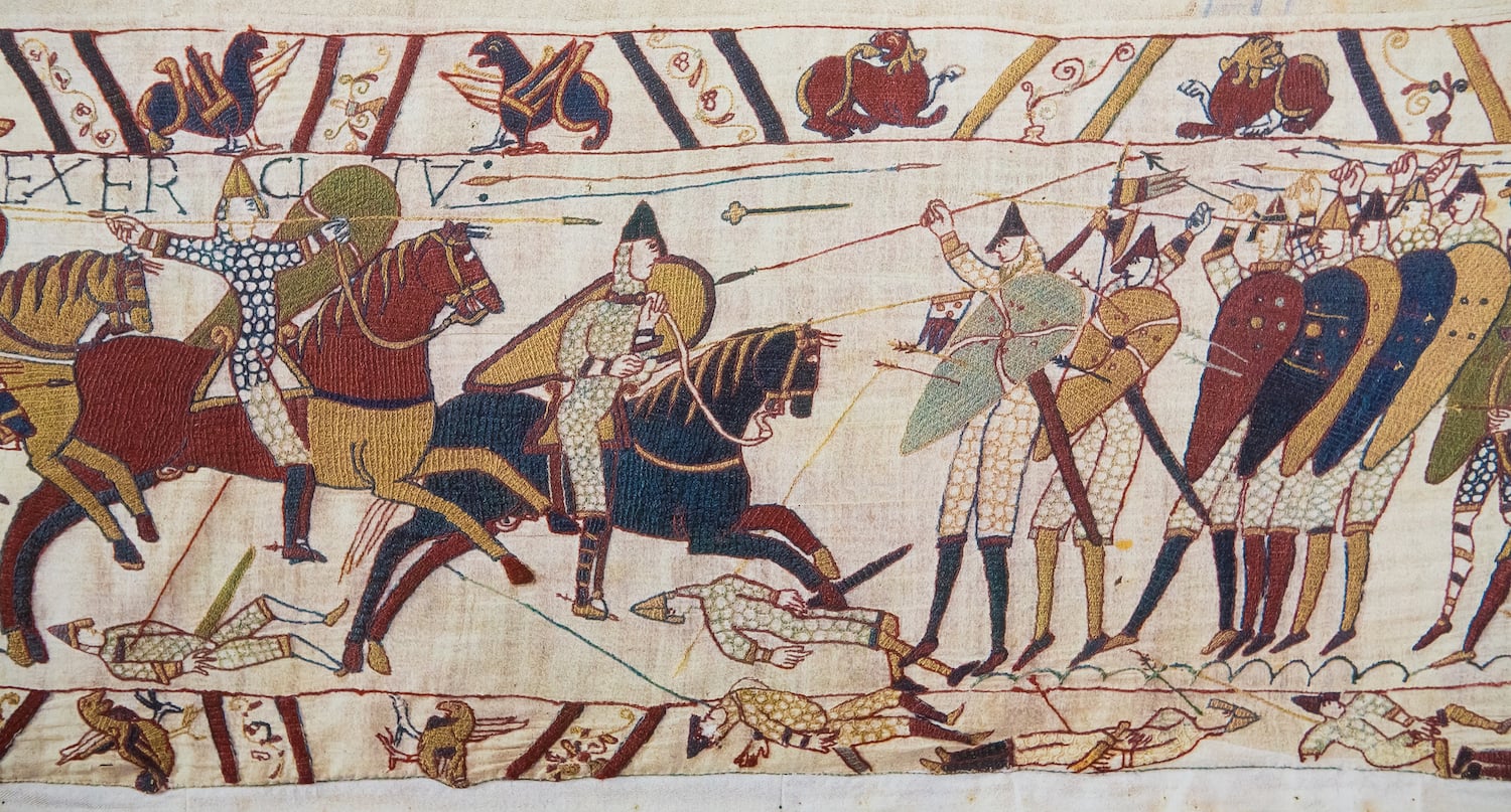Detail of the Bayeux Tapestry showing Norman knights on horseback clashing with Saxon soldiers at the Battle of Hastings, 1066