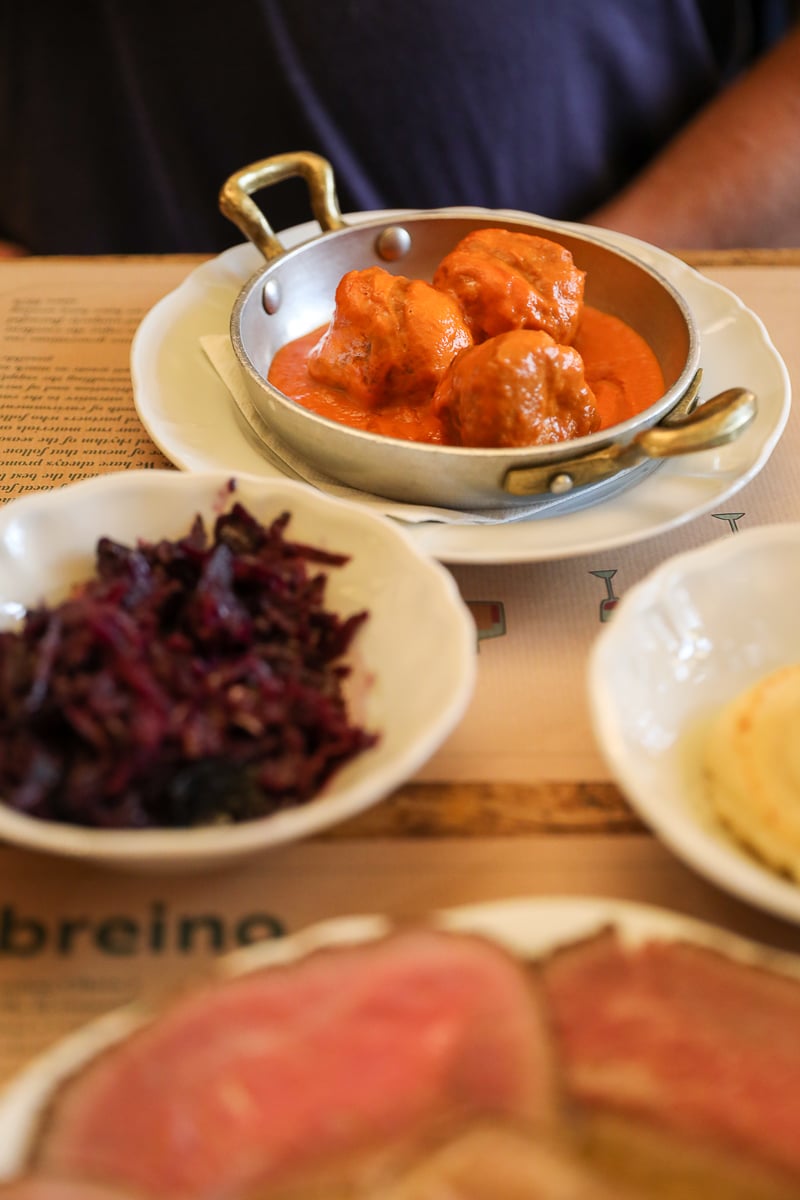 Chicken and ricotta meatballs in tomato sauce served in a small skillet at Cibrèo Trattoria (Il Cibrèino) in Florence.