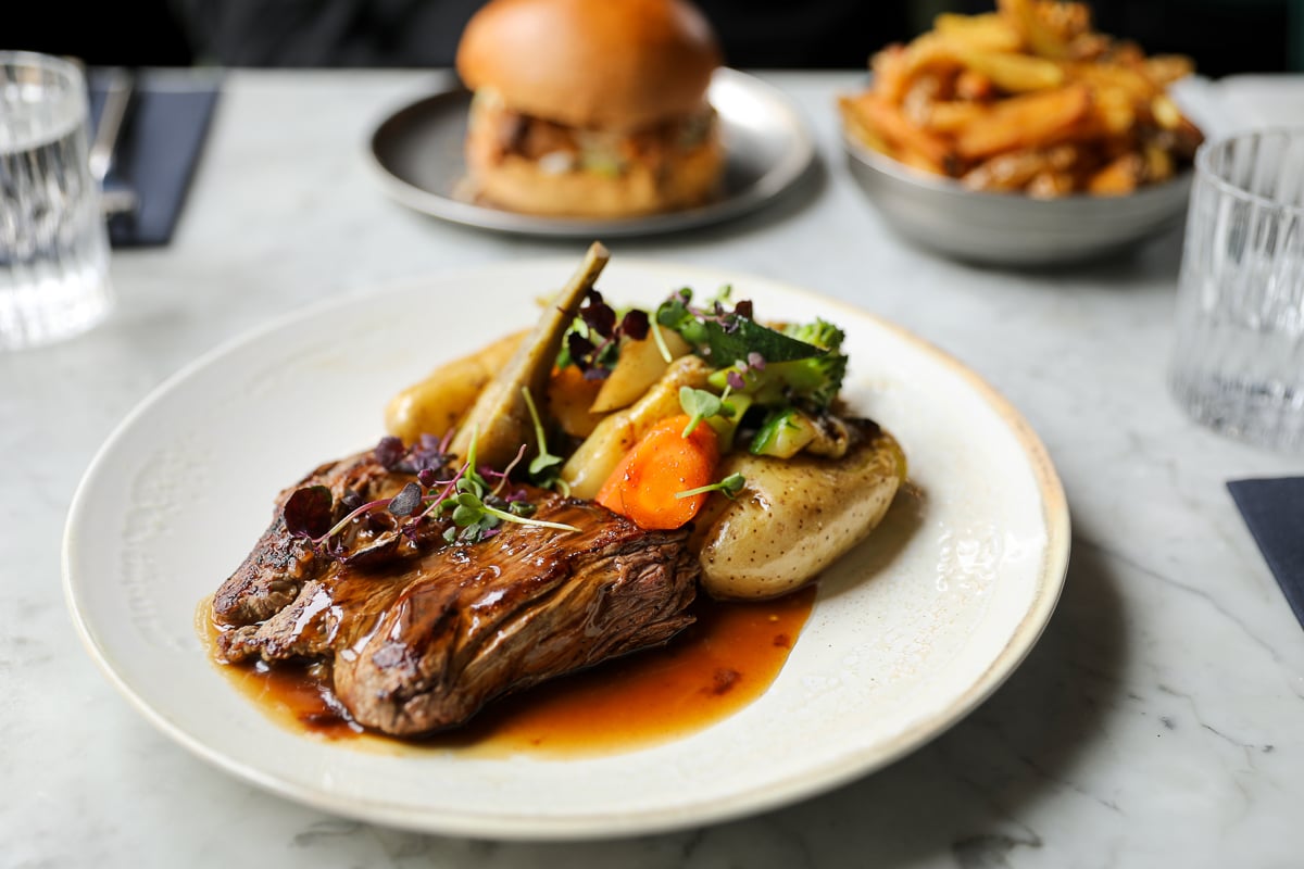 Butcher's cut steak with vegetables and a gourmet burger for lunch at Sacré Bistro in Épernay