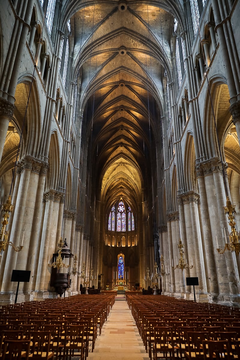 Soaring Gothic nave and stained glass of Notre-Dame de Reims Cathedral