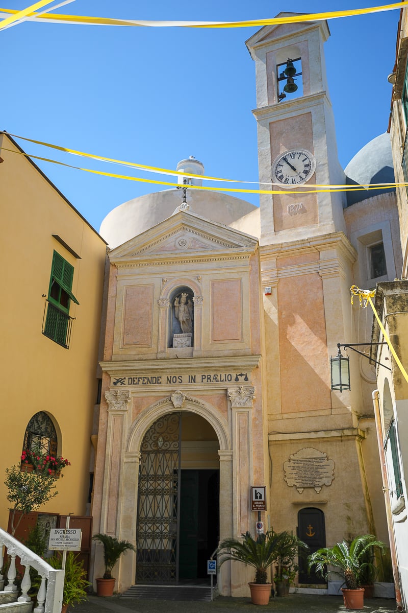 Facade and bell tower of the San Michele Arcangelo abbey church in the Terra Murata district of Procida