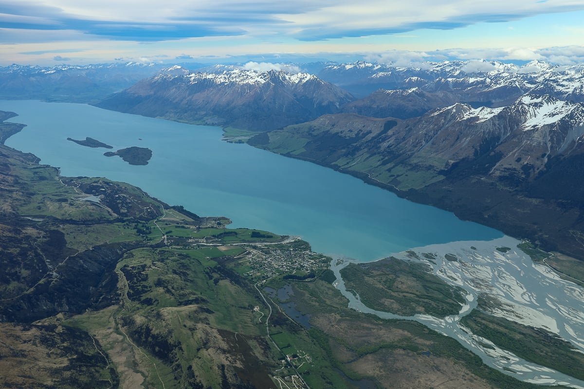 Aerial view of Lake Wakatipu and snow-capped Southern Alps on a scenic flight from Queenstown