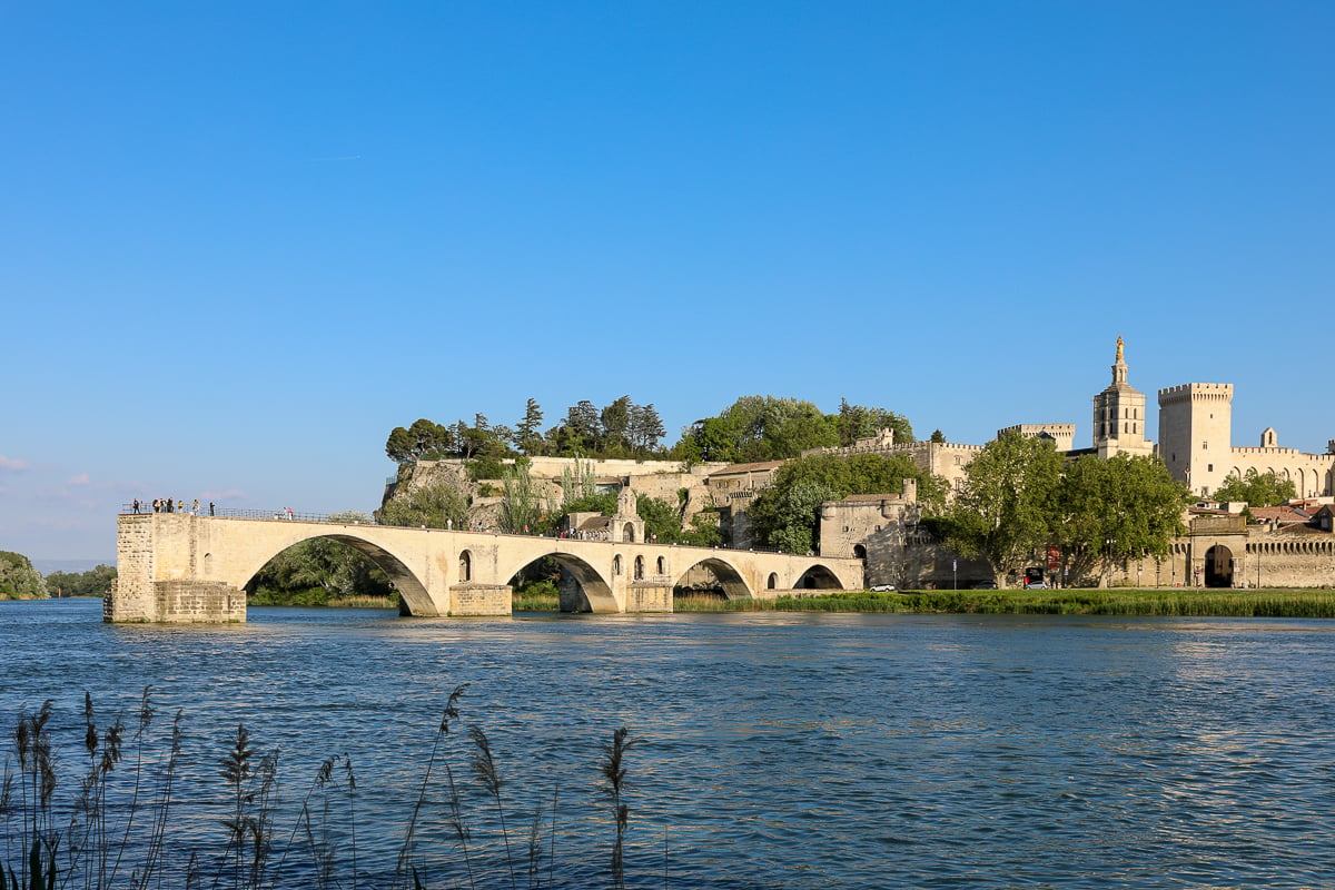 Pont d’Avignon over the Rhône River with the Palais des Papes and Notre-Dame des Doms in the background