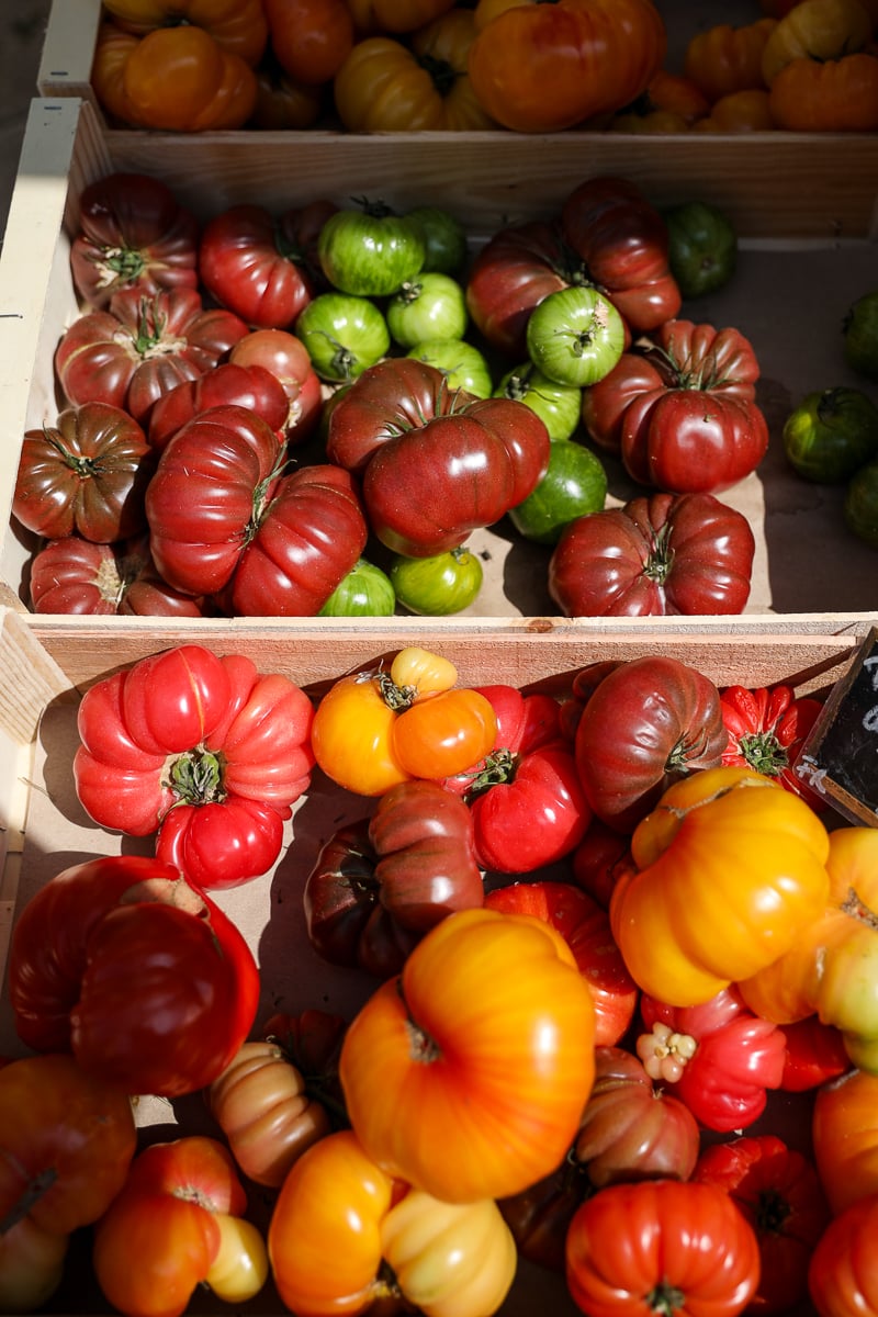 Colorful heirloom tomatoes for sale at Avignon’s Saturday Provençal market