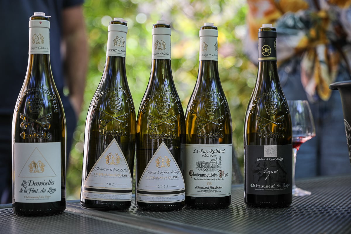 Five Châteauneuf-du-Pape wines lined up for a tasting at Château de la Font du Loup
